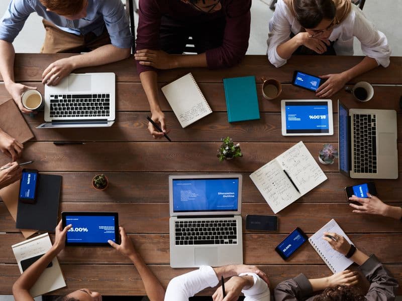 Graphic designer workspace with drawing tablet and desktop monitor canvas